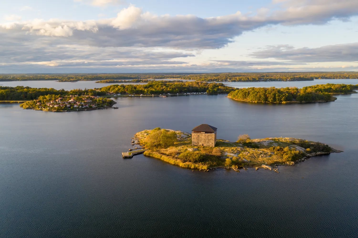 Aerial view of Karlskrona archipelago at Drottningskär, the sea, the small islands and the evening light