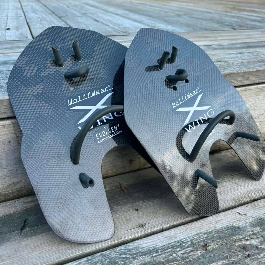X-Wing carbon paddle by Evolvent for Wolffwear, hand-laminated carbon